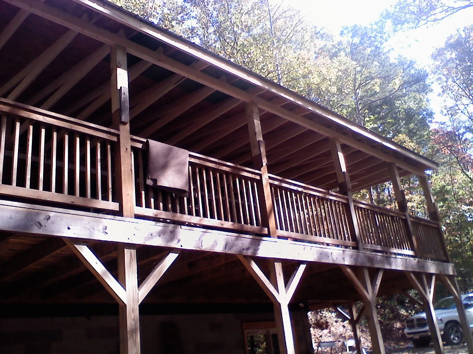 Timber framing under a new elevated porch and deck — Roof Leak Repair in Oklahoma City by Roofing Brothers